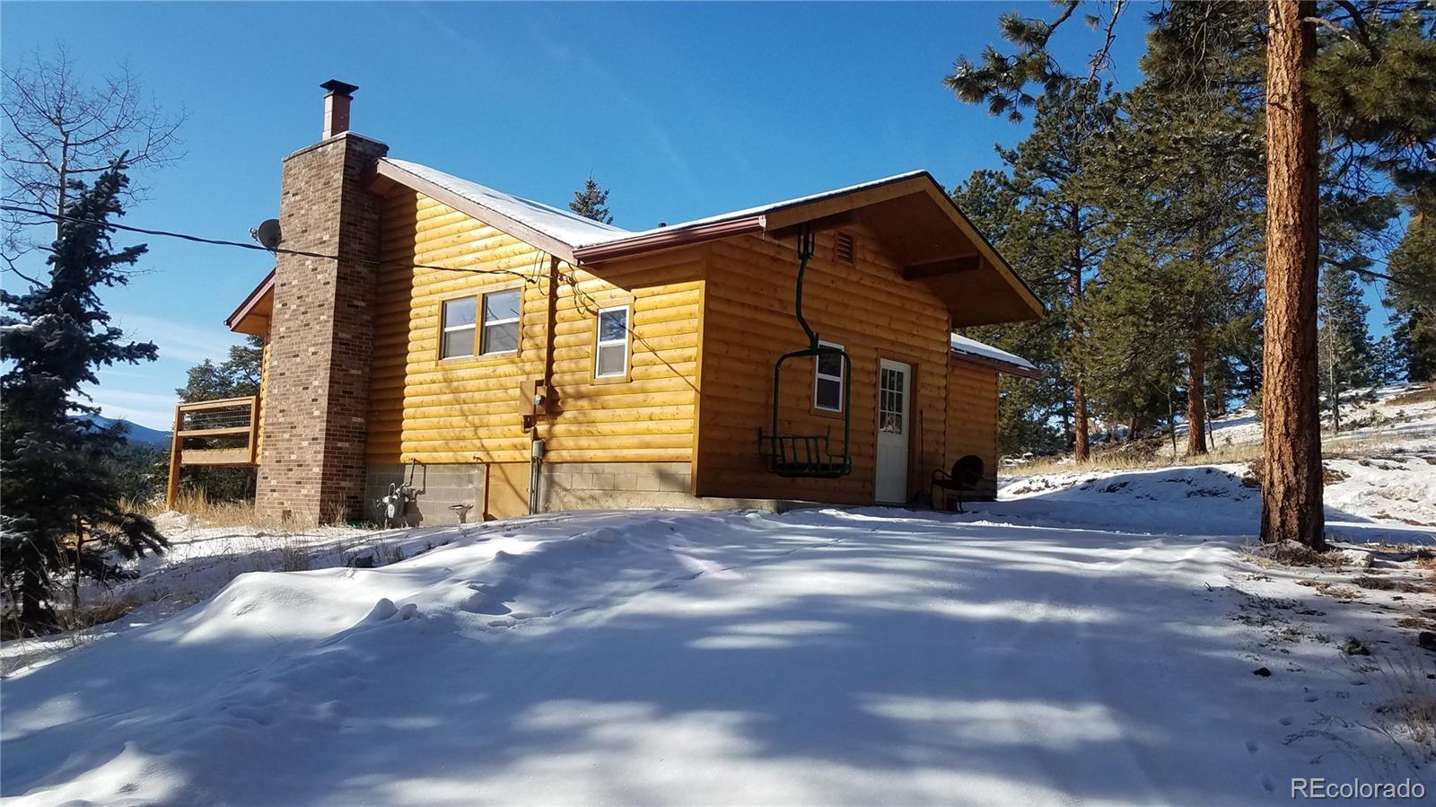 67 Hold Up Street Bailey, CO 80421 - Photo 3 of 25 a view of a house with a yard