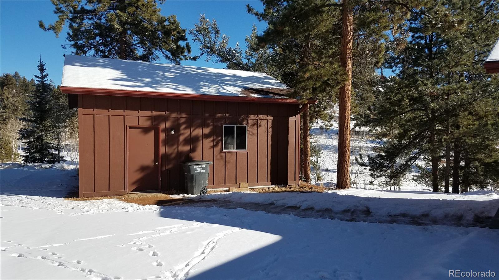 67 Hold Up Street Bailey, CO 80421 - Photo 5 of 25 a view of a house with large tree