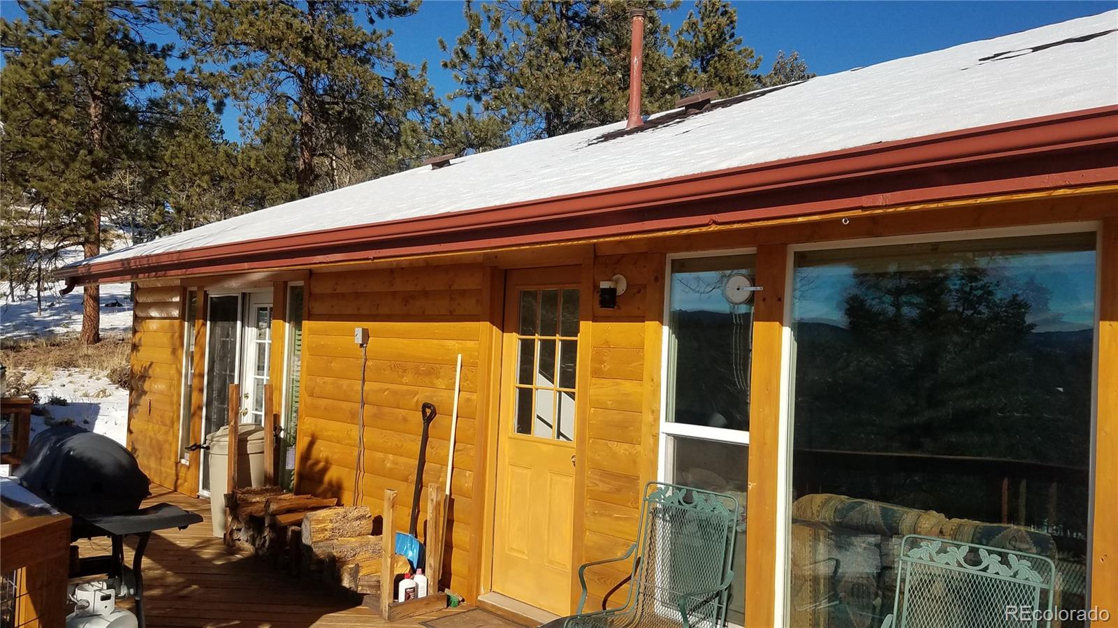 67 Hold Up Street Bailey, CO 80421 - Photo 6 of 25 a view of backyard with cabin