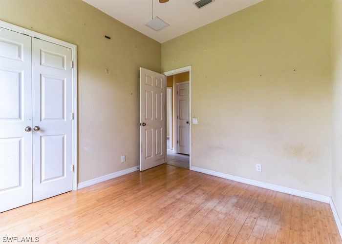 8981 Falcon Pointe Loop Fort Myers, FL 33912 - Photo 16 of 25 an empty room with a natural light
