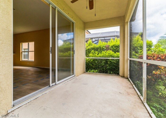 8981 Falcon Pointe Loop Fort Myers, FL 33912 - Photo 4 of 25 a view of backyard and porch