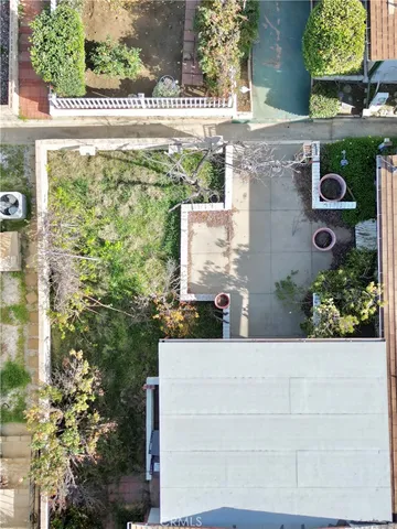 front view of a house with a large window