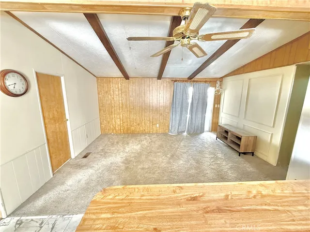 a kitchen with a stove a sink and a refrigerator