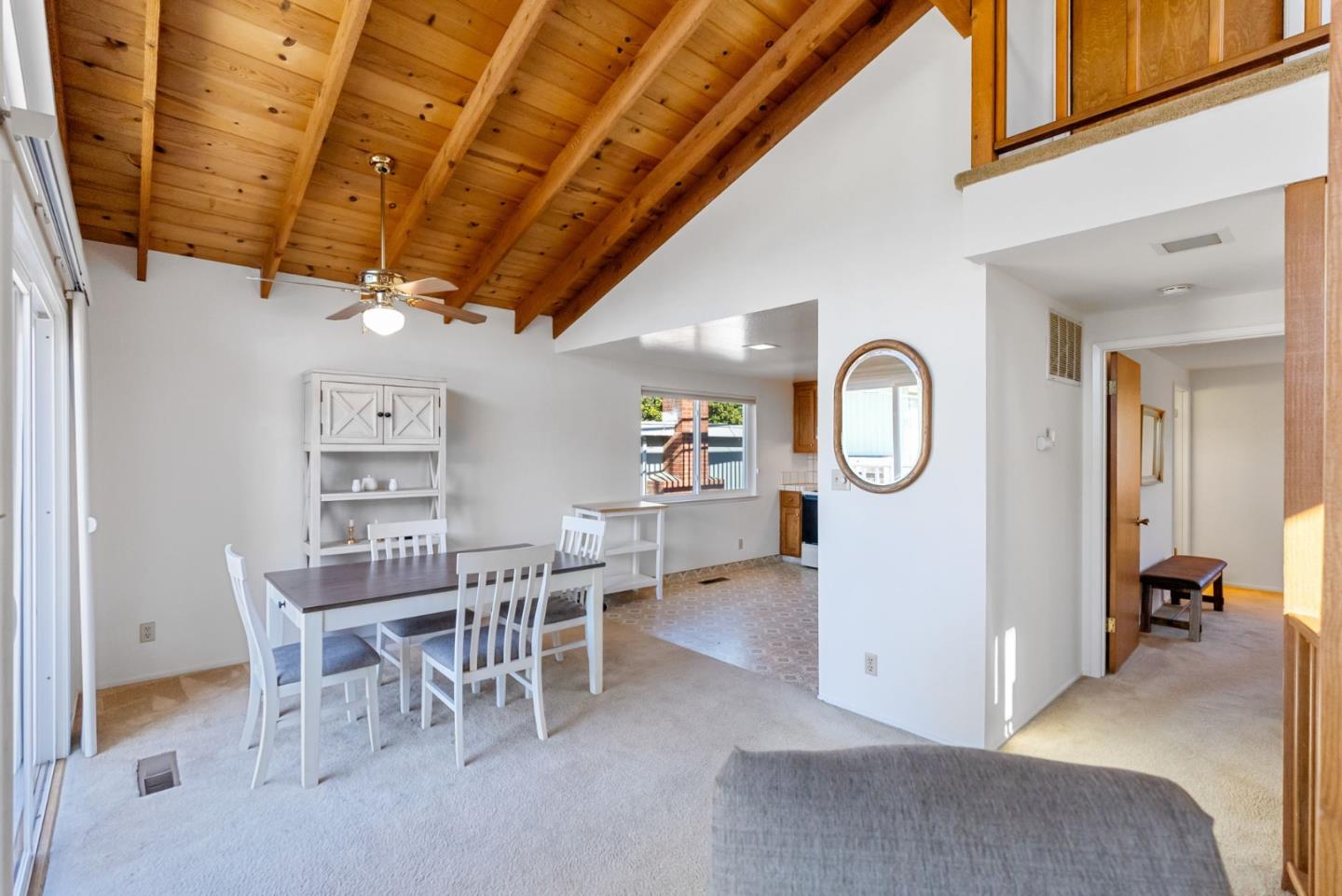 135 Stephen Road Aptos, CA 95003 - Photo 11 of 44 a view of a dining room with furniture and a chandelier