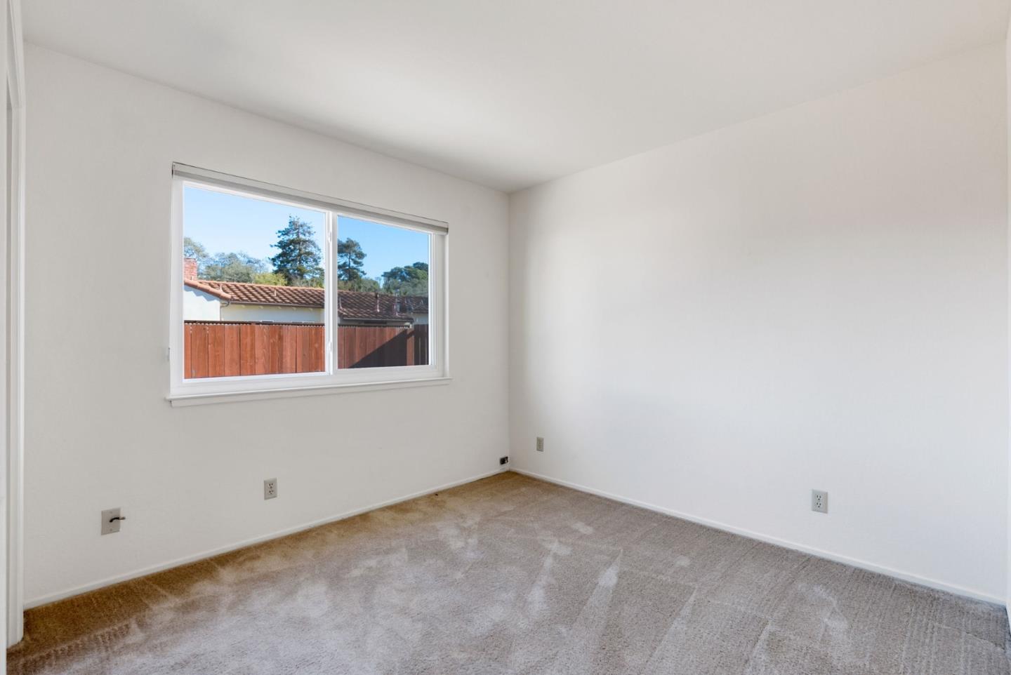 135 Stephen Road Aptos, CA 95003 - Photo 25 of 44 an empty room with windows