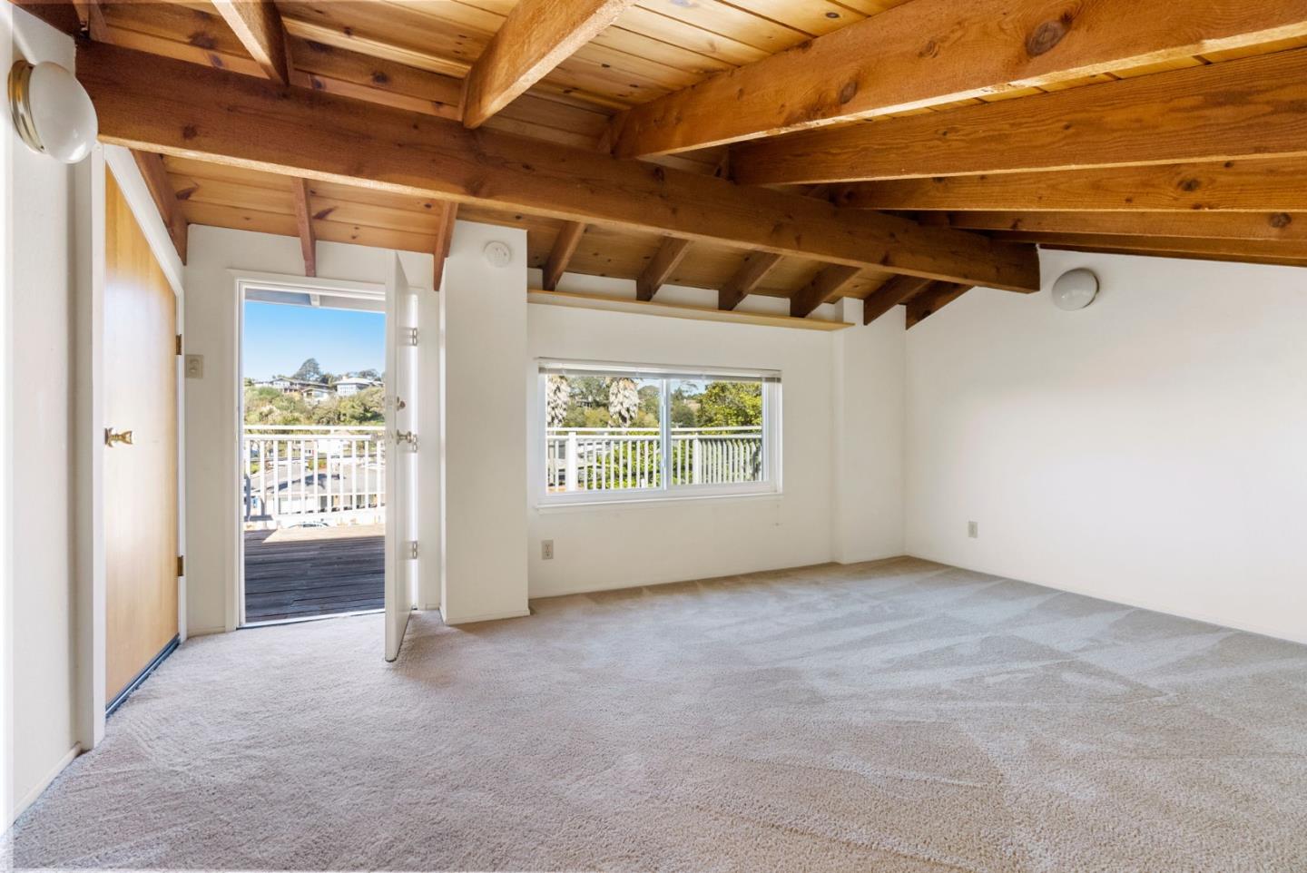 135 Stephen Road Aptos, CA 95003 - Photo 28 of 44 a view of an empty room with a fireplace