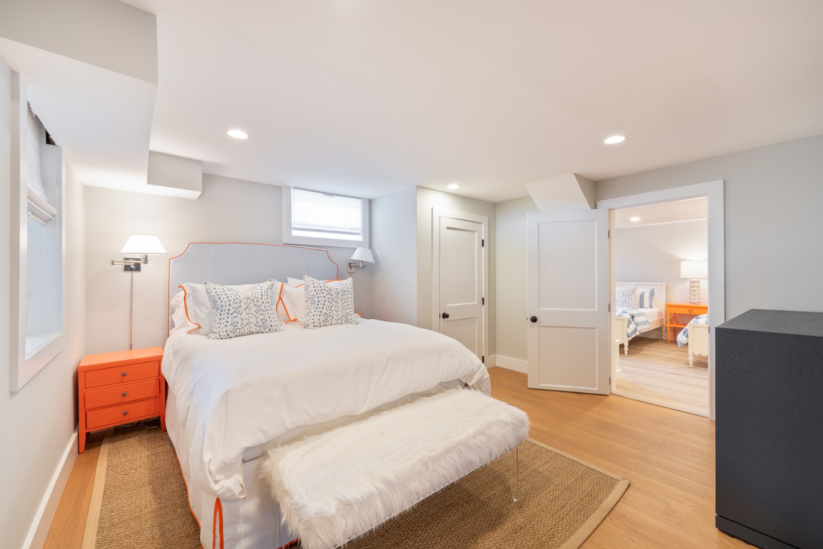 2 Silver Street Nantucket, MA 02554 - Photo 27 of 30 a spacious bedroom with a bed and a couch
