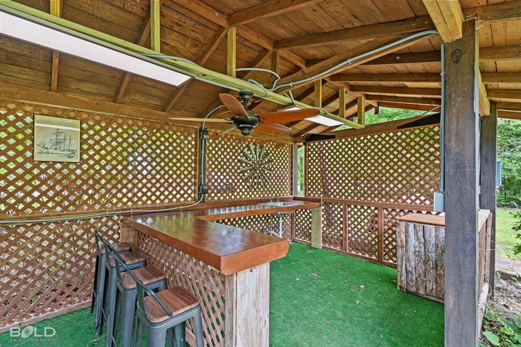 1231 Pine Island Road Shreveport, LA 71107 - Photo 6 of 40 a view of a backyard