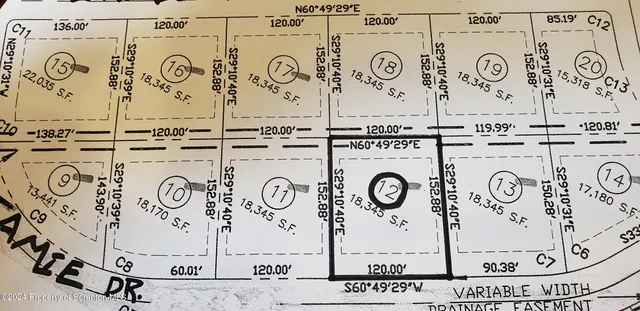 a close up of a wall with a white and white wall