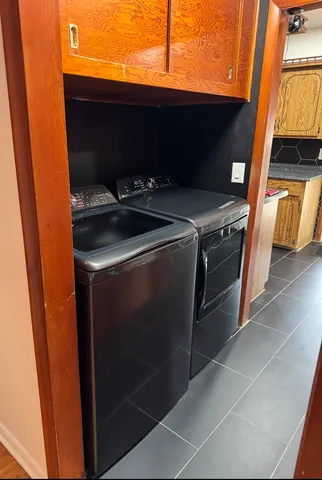 a close up of a stove and a microwave
