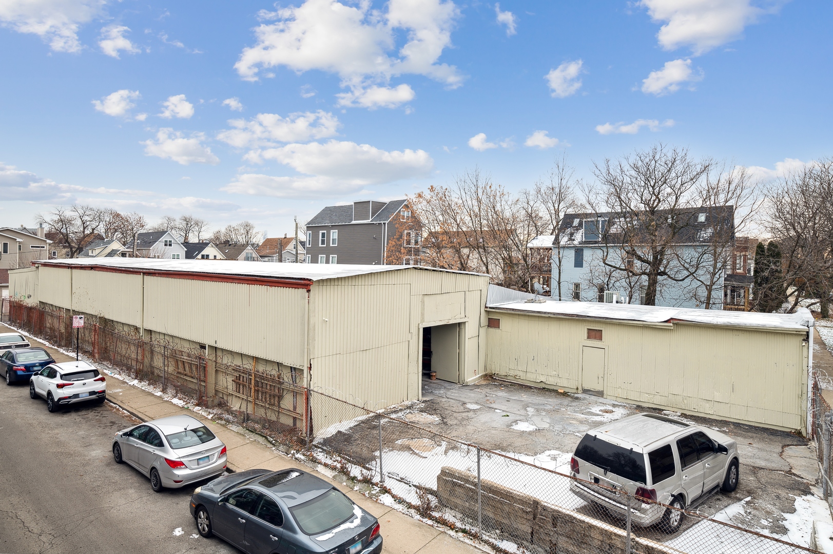 1753 North Spaulding Avenue Chicago, IL 60647 - Photo 1 of 15 a view of a parking space with car parked