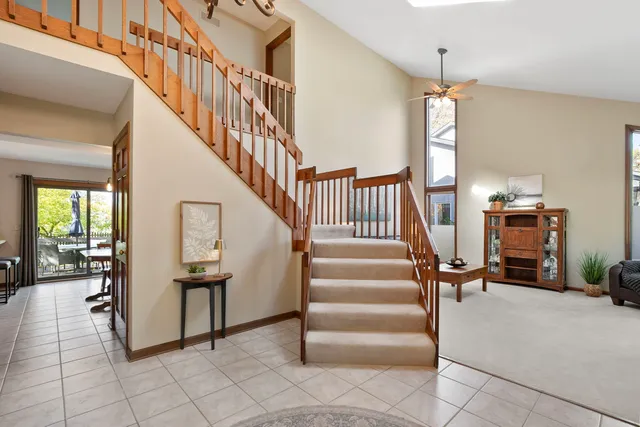 a view of entryway and hall with dining area