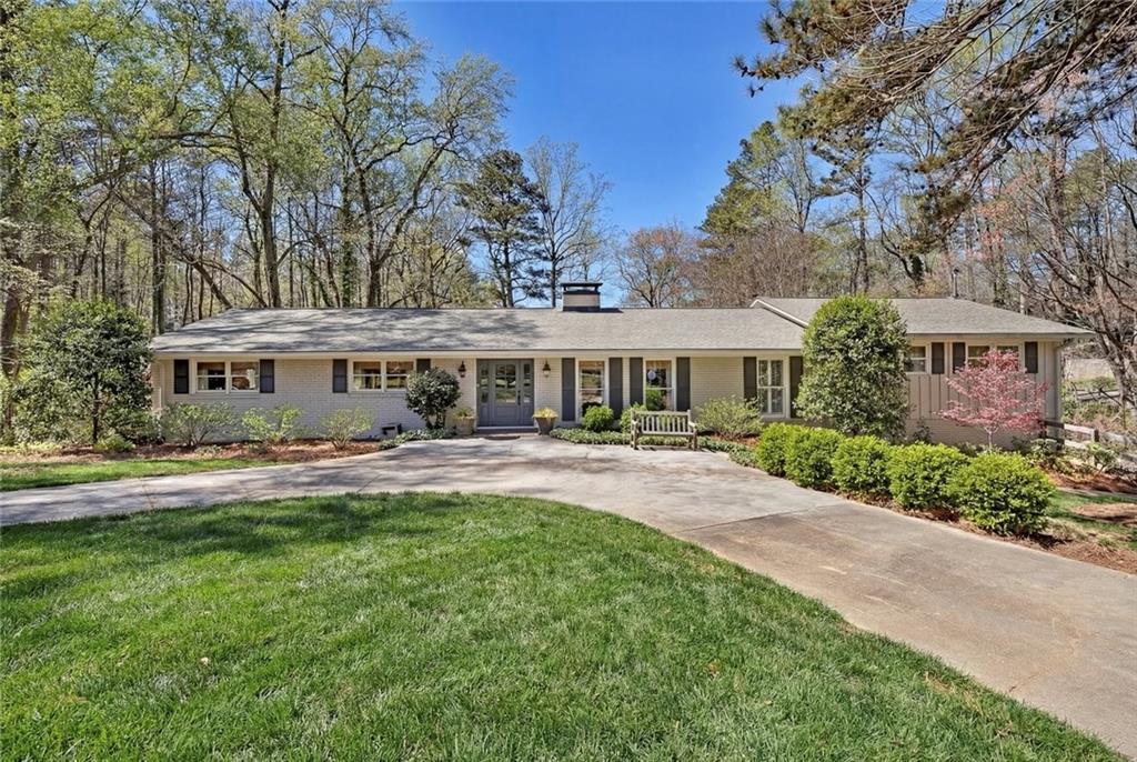 1424 Ridgeway Drive Northwest Acworth, GA 30102 - Photo 1 of 38 a front view of a house with yard patio and swimming pool