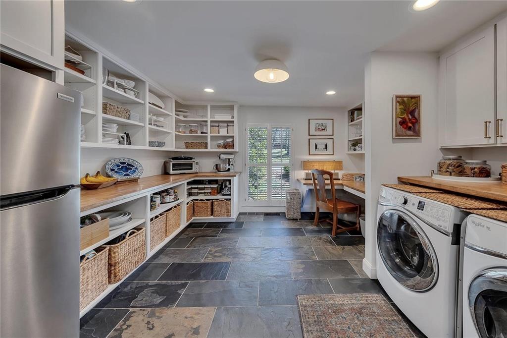 1424 Ridgeway Drive Northwest Acworth, GA 30102 - Photo 13 of 38 a view of kitchen with washer and dryer