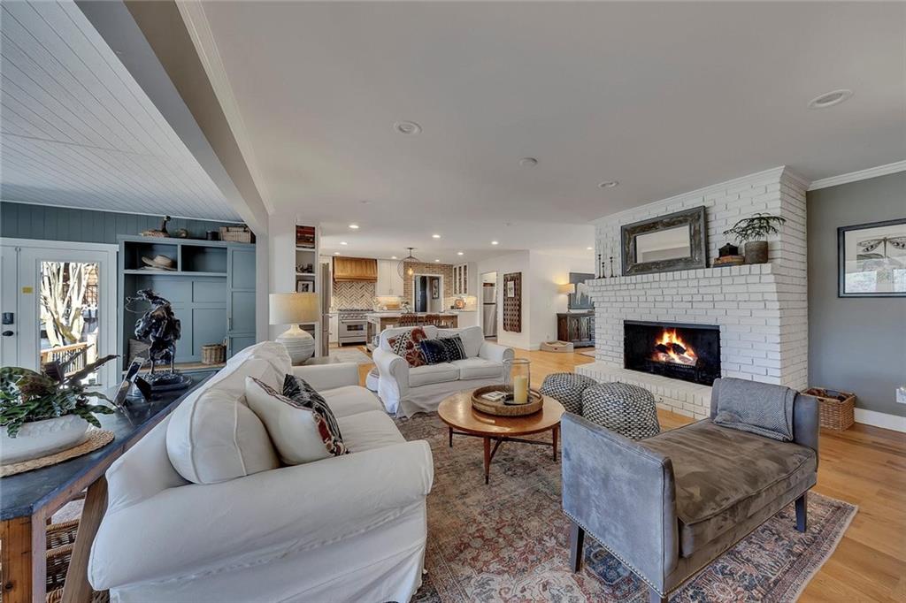 1424 Ridgeway Drive Northwest Acworth, GA 30102 - Photo 14 of 38 a living room with furniture and a fireplace