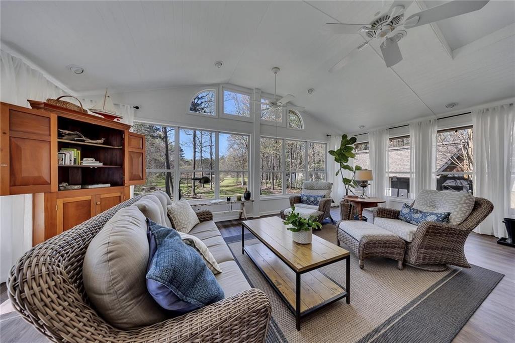 1424 Ridgeway Drive Northwest Acworth, GA 30102 - Photo 17 of 38 a living room with furniture fireplace and a large window