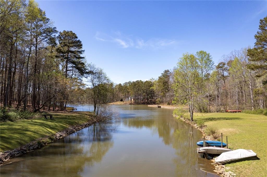 1424 Ridgeway Drive Northwest Acworth, GA 30102 - Photo 2 of 38 a view of a lake with houses