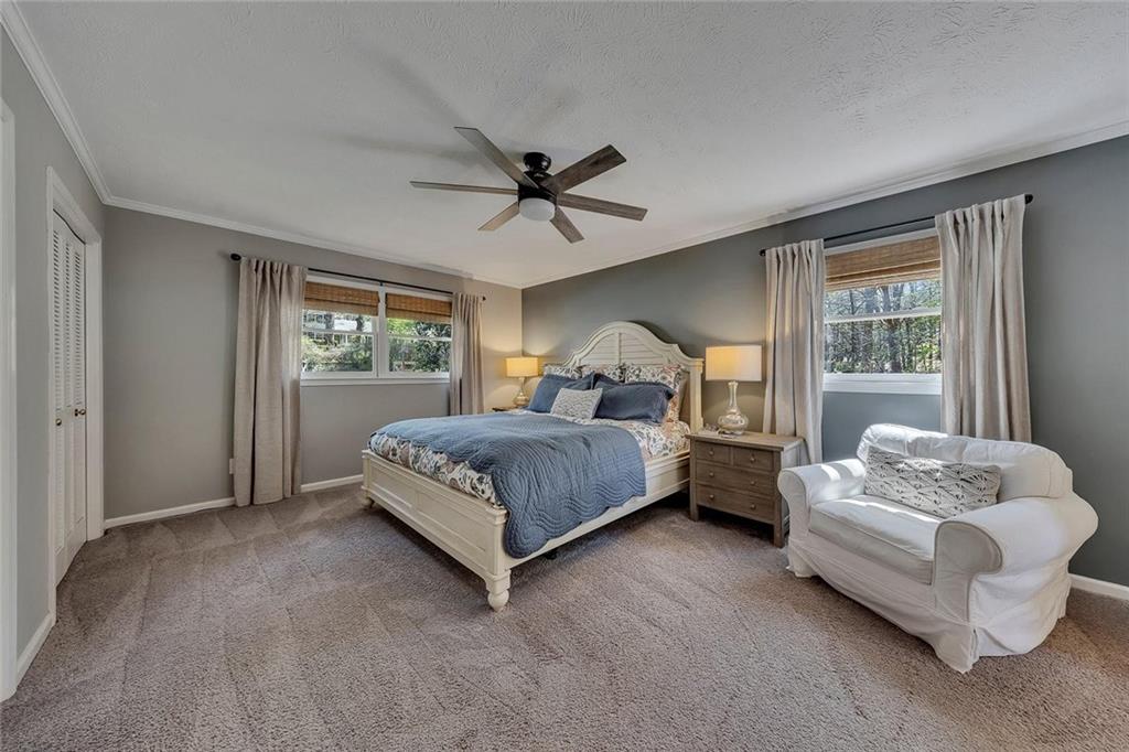 1424 Ridgeway Drive Northwest Acworth, GA 30102 - Photo 21 of 38 a bedroom with a bed and window