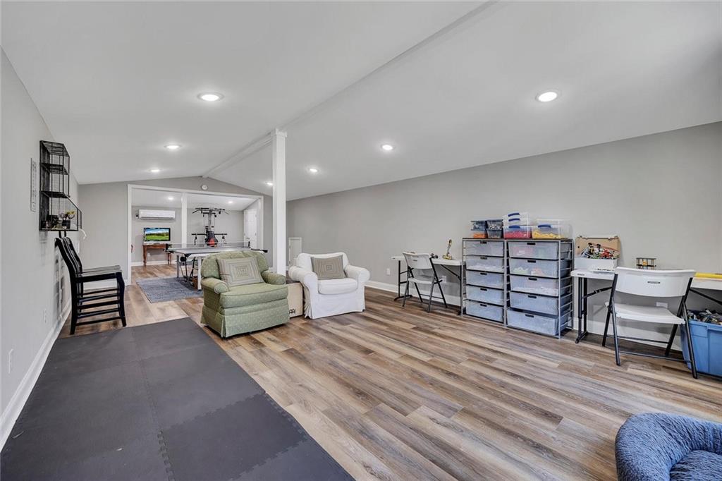 1424 Ridgeway Drive Northwest Acworth, GA 30102 - Photo 27 of 38 a living room with furniture and a wooden floor