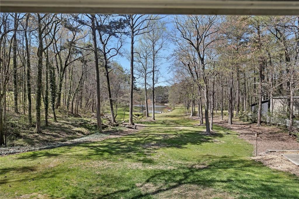 1424 Ridgeway Drive Northwest Acworth, GA 30102 - Photo 29 of 38 a view of a backyard with large trees
