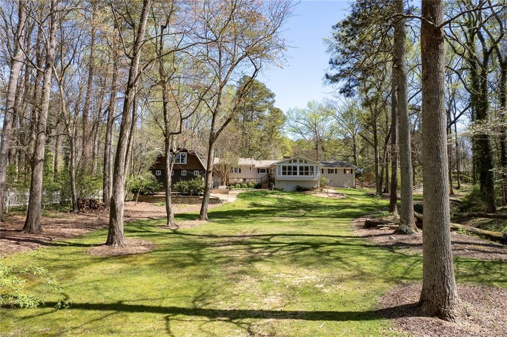1424 Ridgeway Drive Northwest Acworth, GA 30102 - Photo 3 of 38 a view of a fountain in the backyard of house