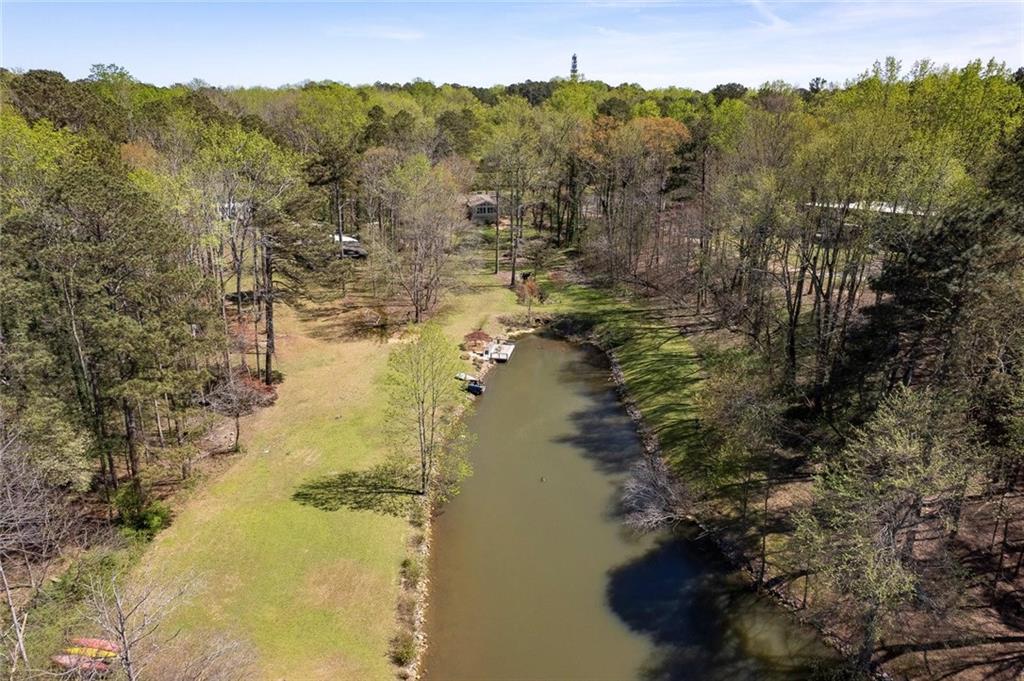 1424 Ridgeway Drive Northwest Acworth, GA 30102 - Photo 35 of 38 a view of a lake in middle of forest