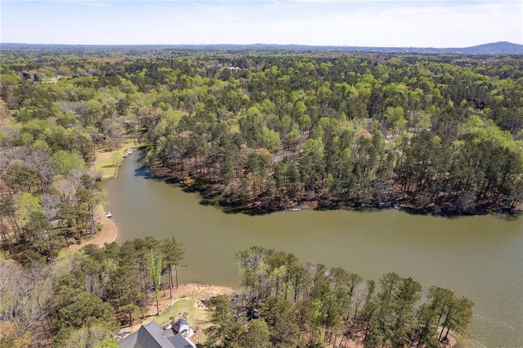1424 Ridgeway Drive Northwest Acworth, GA 30102 - Photo 37 of 38 a view of a lake with a mountain in the background