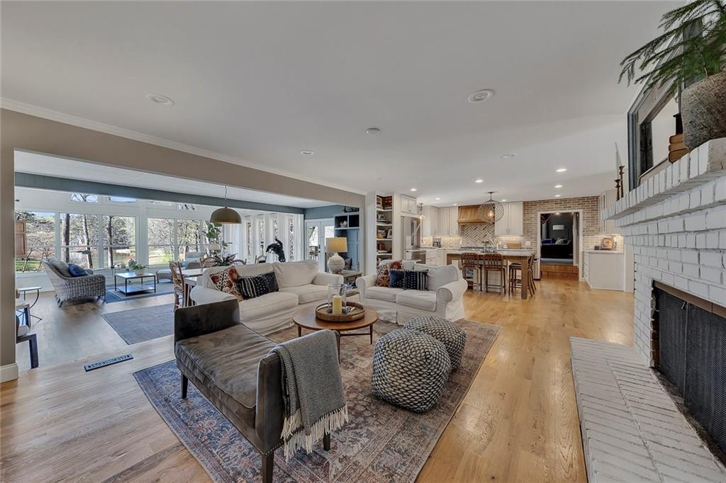 1424 Ridgeway Drive Northwest Acworth, GA 30102 - Photo 9 of 38 a living room with fireplace furniture and a fireplace