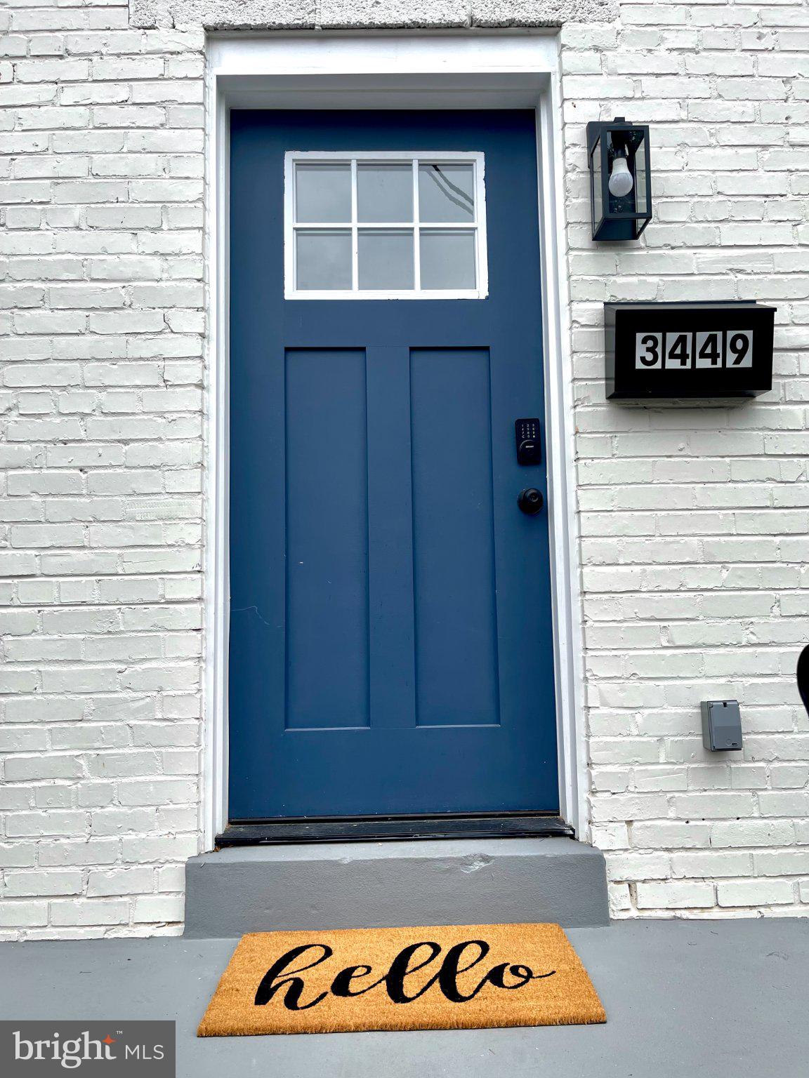 3449 23rd Street Southeast Washington, DC 20020 - Photo 2 of 8 Charming blue door welcomes all.