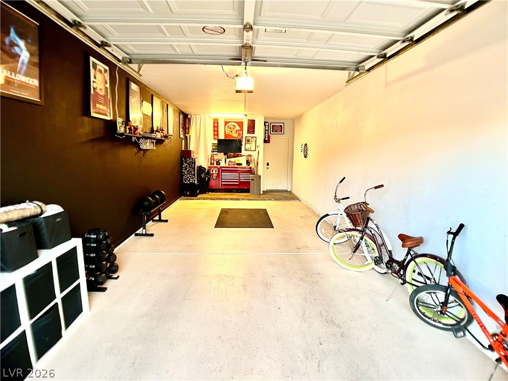 2050 West Warm Springs Road, Unit 321 Henderson, NV 89014 - Photo 22 of 28 This versatile garage space offers ample room and direct access to the interior of the home.