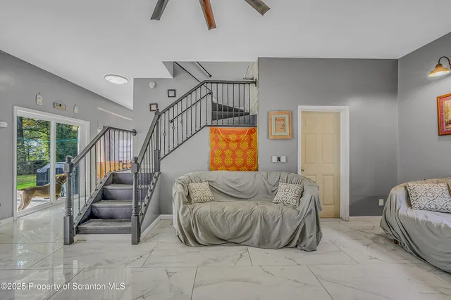 a bedroom with furniture and a couch