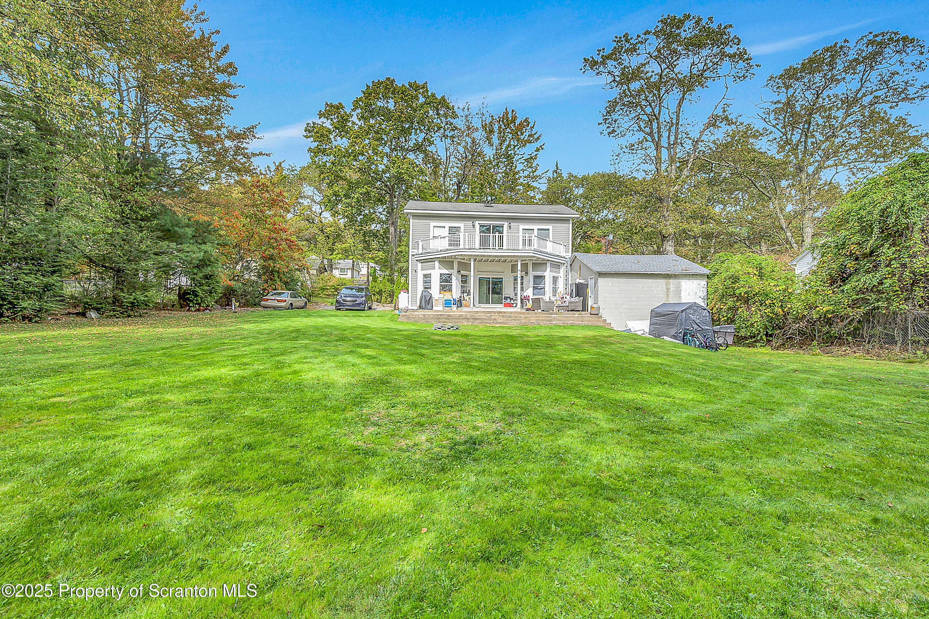 37 Mount Pocono Court Mount Pocono, PA 18344 - Photo 2 of 39 a house view with a sitting space and garden
