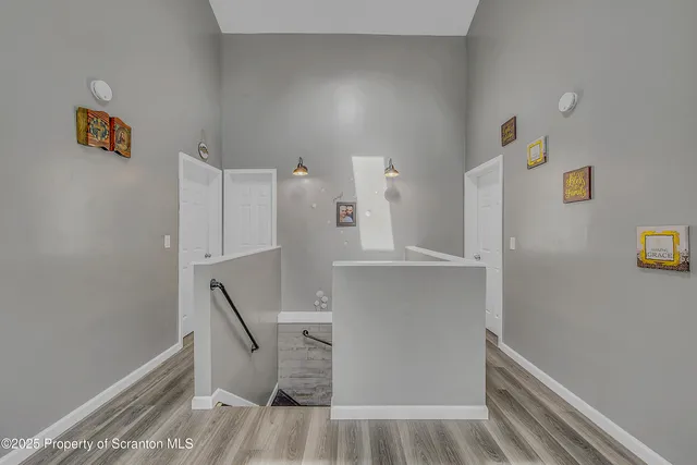 a view of storage and utility room with empty racks