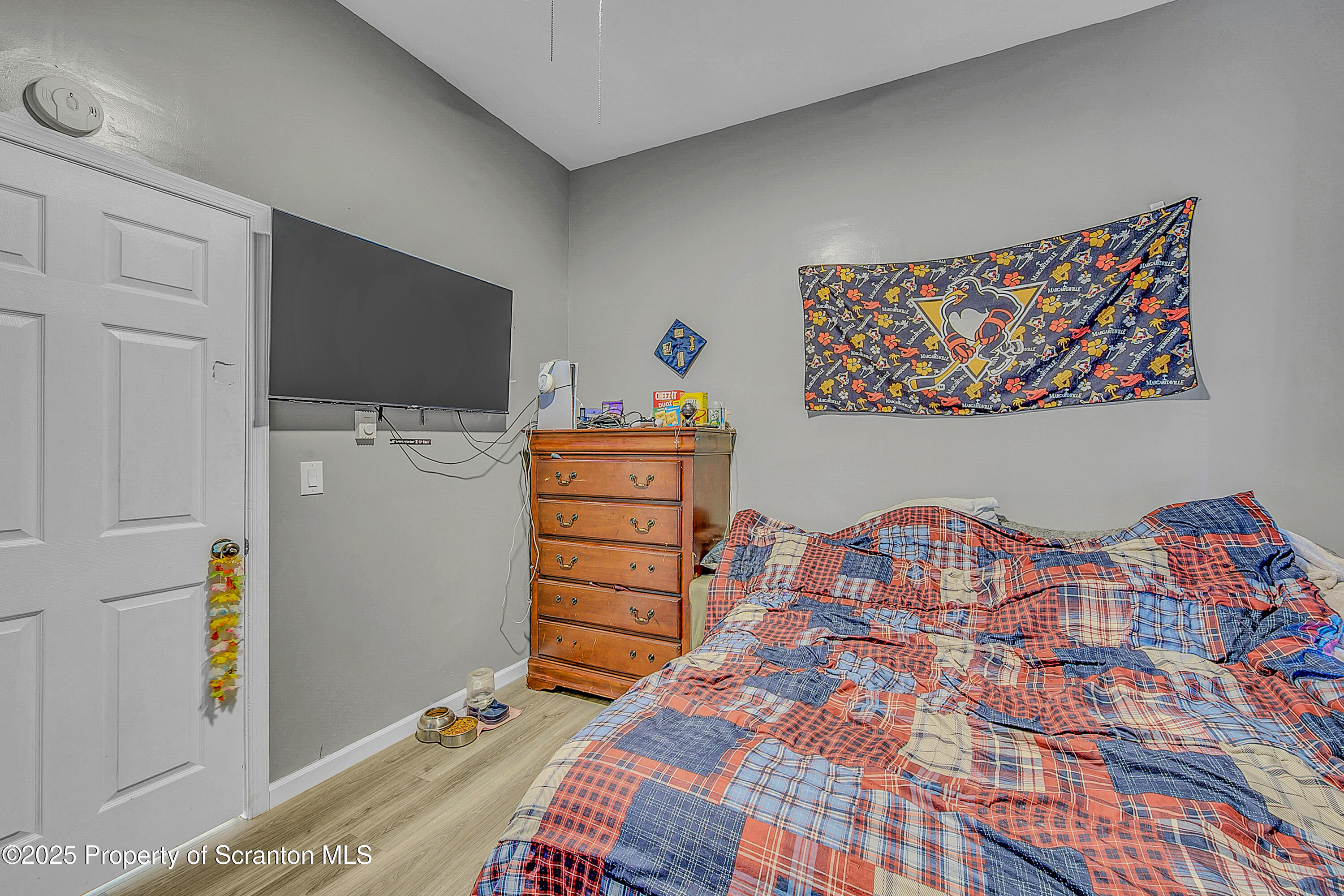 37 Mount Pocono Court Mount Pocono, PA 18344 - Photo 26 of 39 a bedroom with a bed and a television