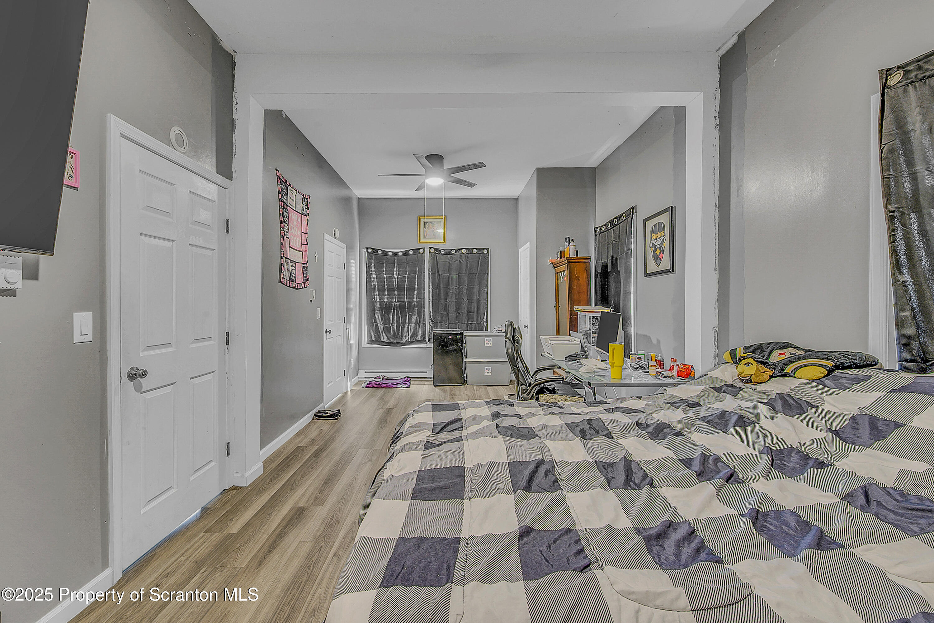 37 Mount Pocono Court Mount Pocono, PA 18344 - Photo 34 of 39 a bedroom with a bed and a mirror