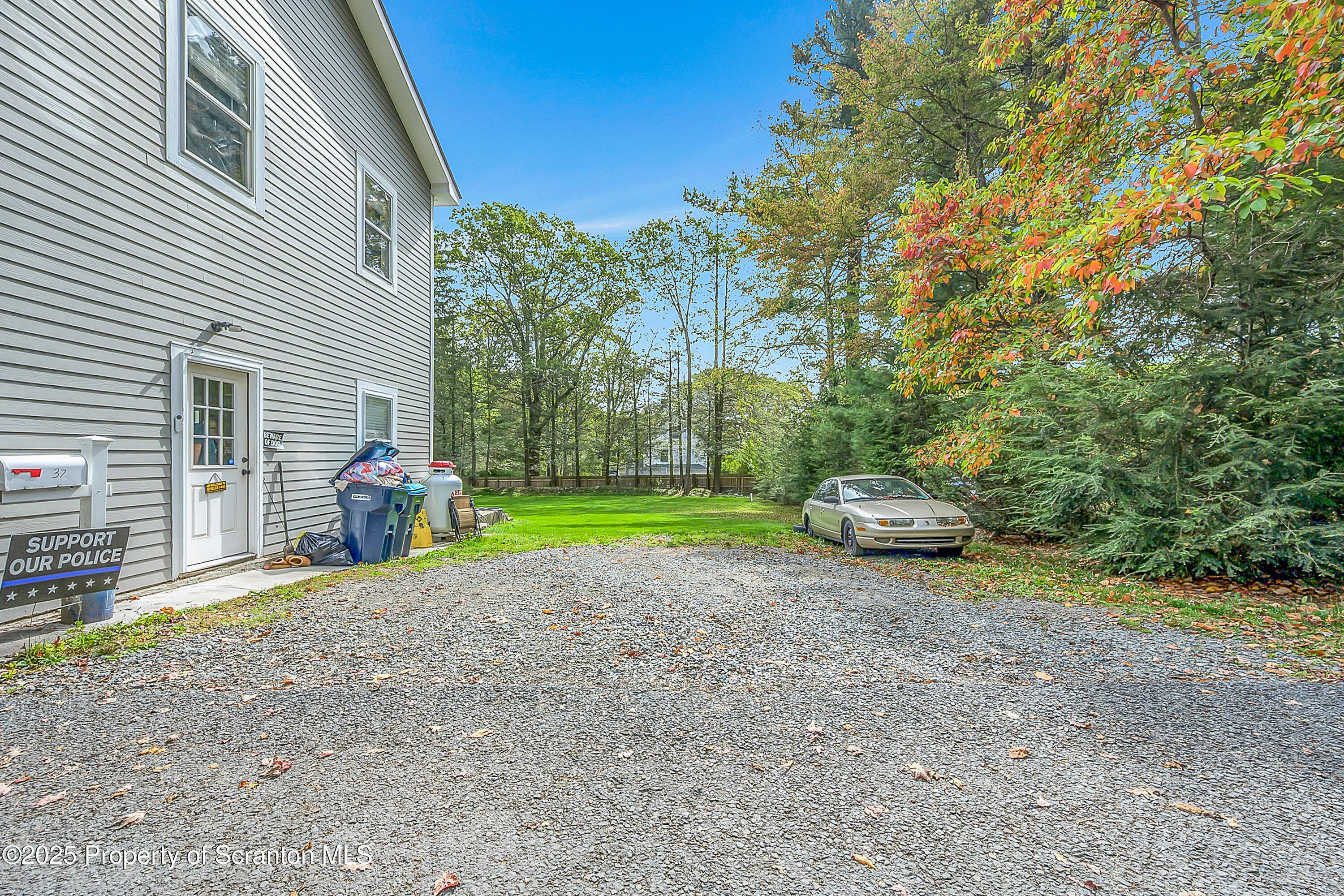 37 Mount Pocono Court Mount Pocono, PA 18344 - Photo 6 of 39 a view of a house with a backyard