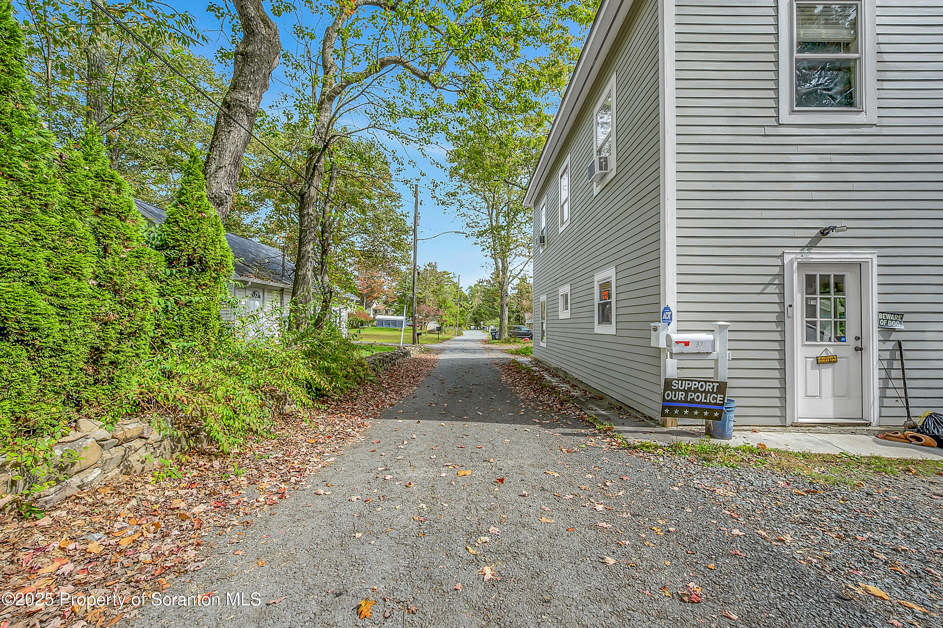 37 Mount Pocono Court Mount Pocono, PA 18344 - Photo 7 of 39 a view of a house with backyard and trees
