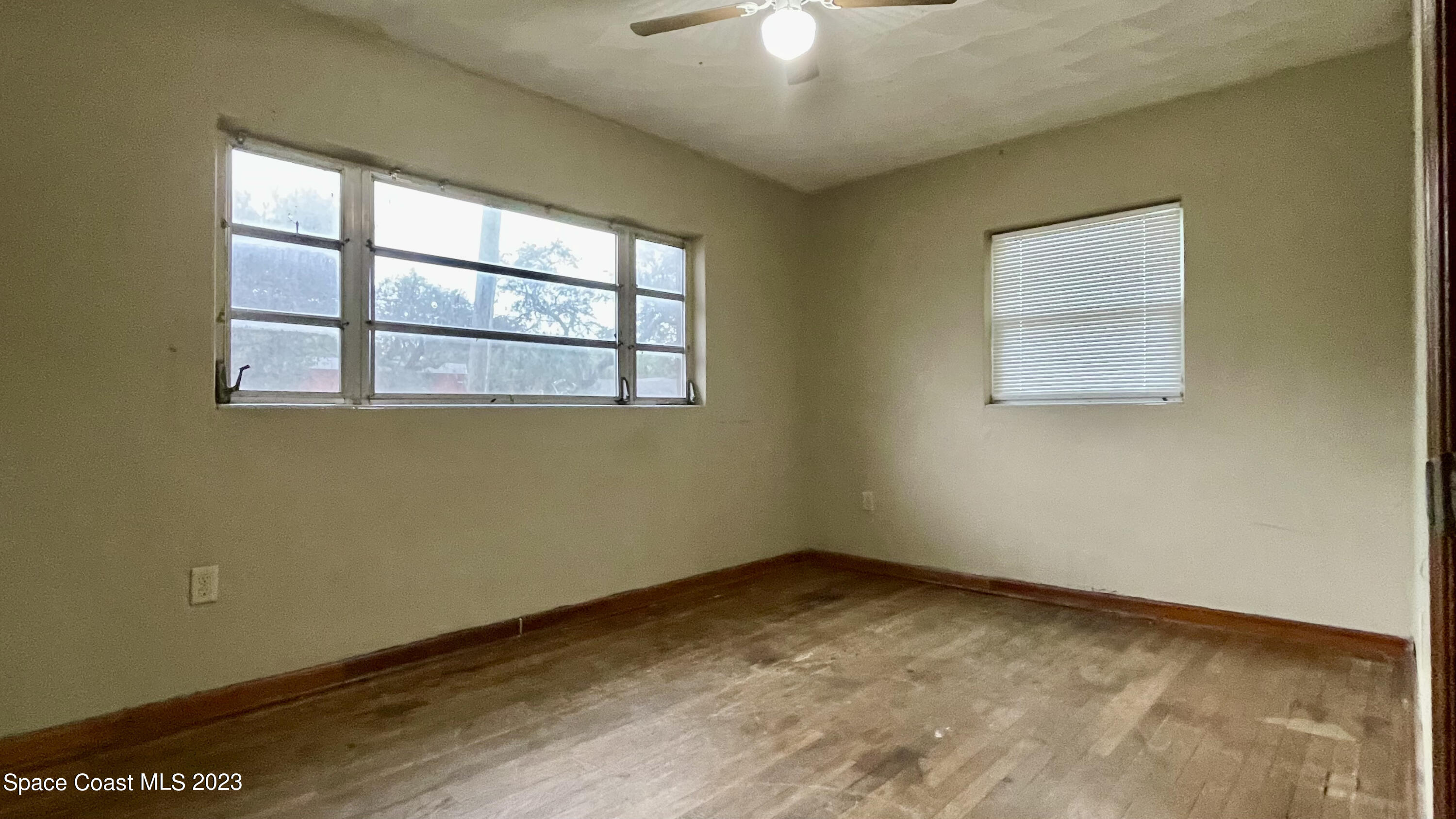 866 Sarno Road Melbourne, FL 32935 - Photo 12 of 19 a view of an empty room with a window