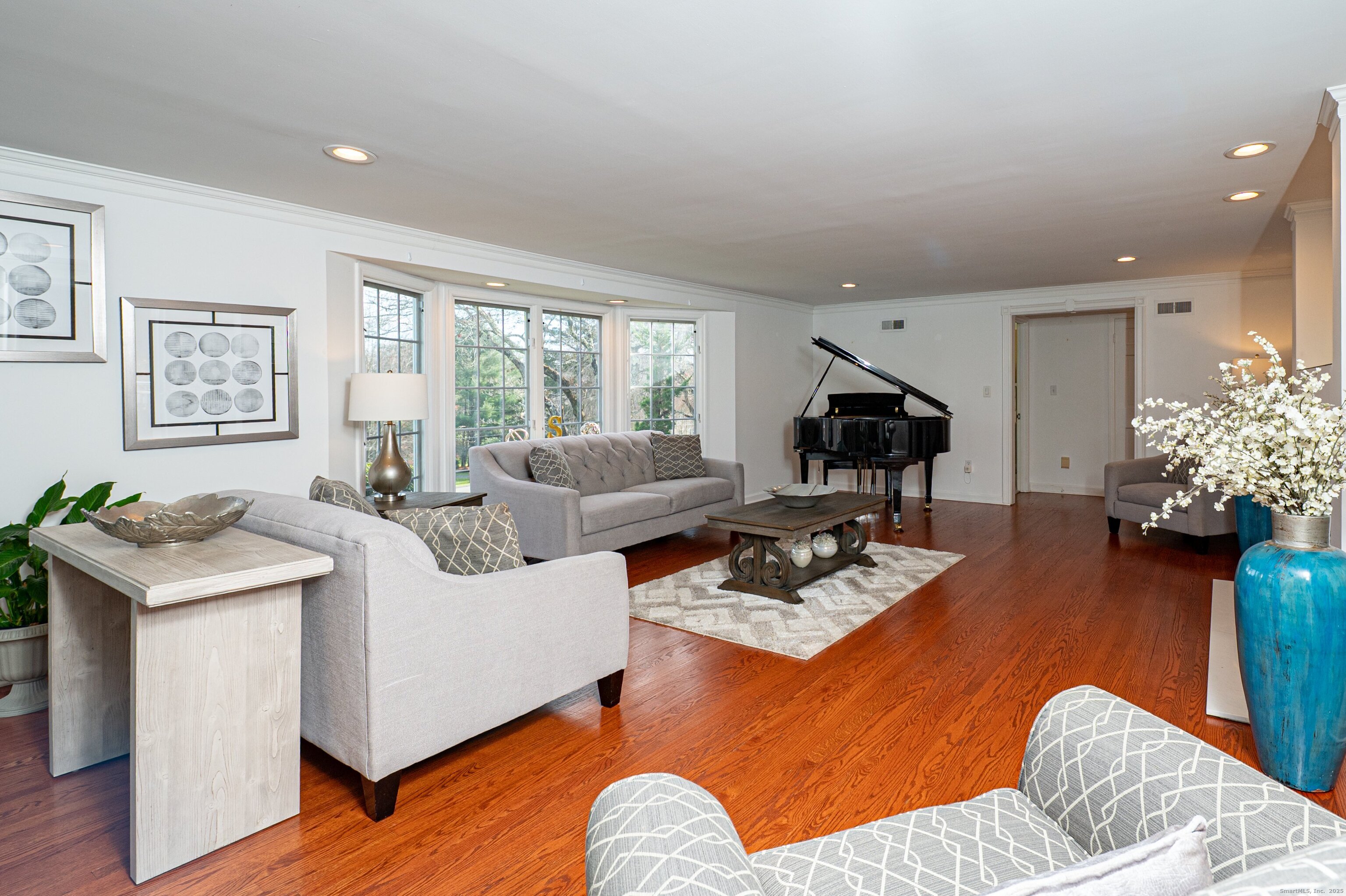 15 Griffing Pond Road Branford, CT 06405 - Photo 12 of 40 a living room with furniture or window and a wooden floor