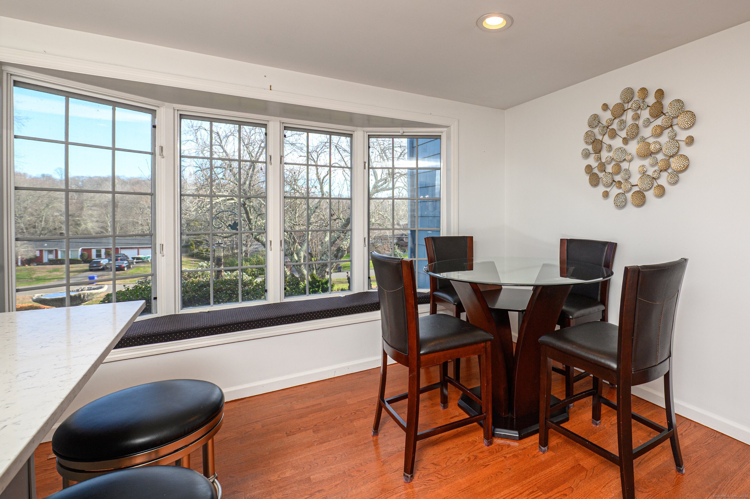 15 Griffing Pond Road Branford, CT 06405 - Photo 21 of 40 a view of a dining room with furniture window and outside view