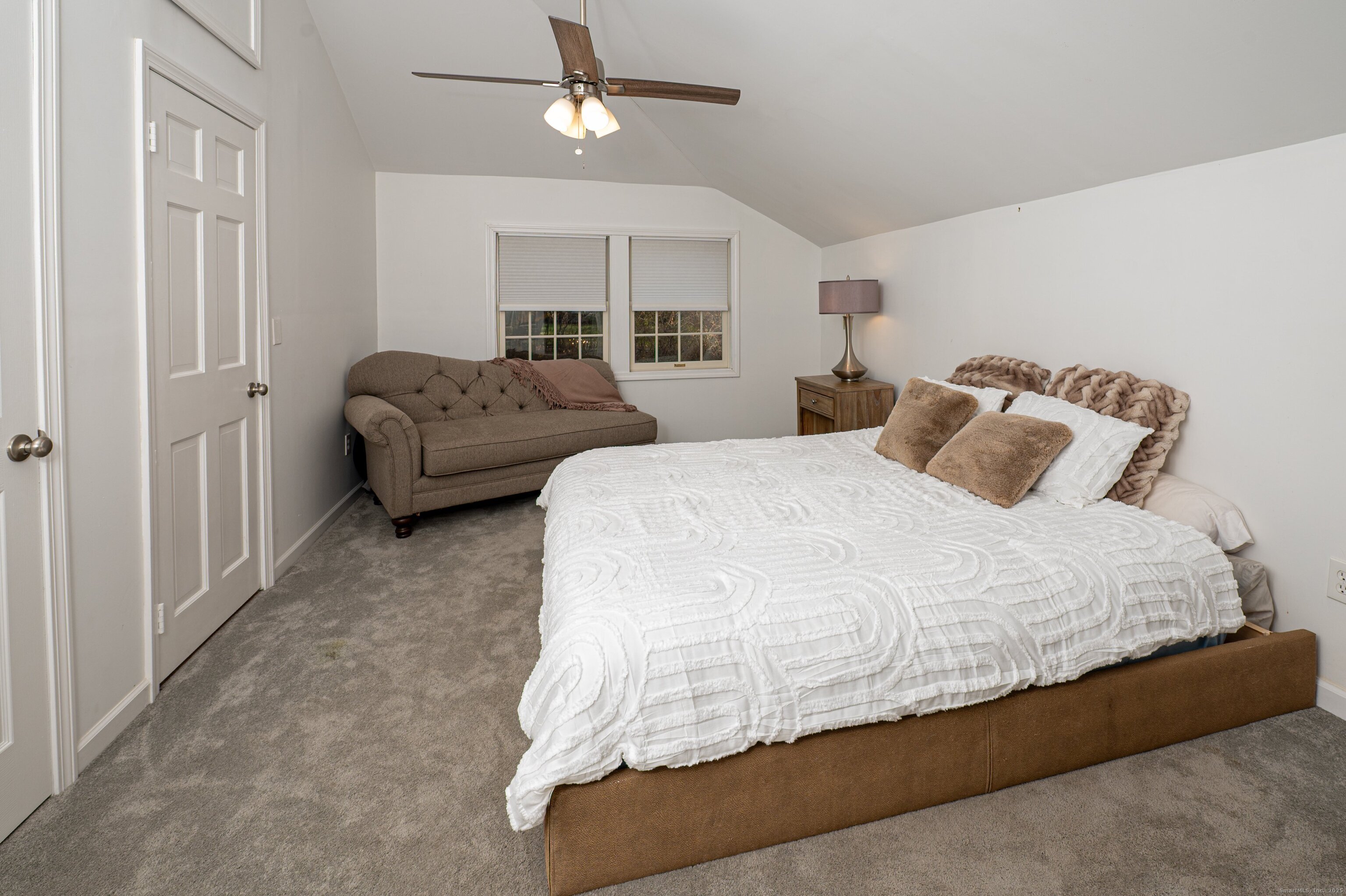 15 Griffing Pond Road Branford, CT 06405 - Photo 36 of 40 a bedroom with bed and window