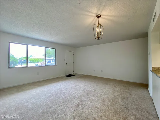 an empty room with window