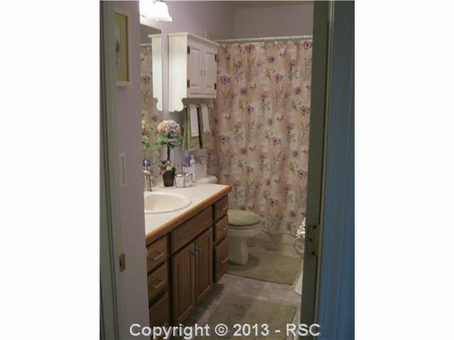 17425 Lodgepole Road Peyton, CO 80831 - Photo 12 of 20 Secondary upstairs full bath