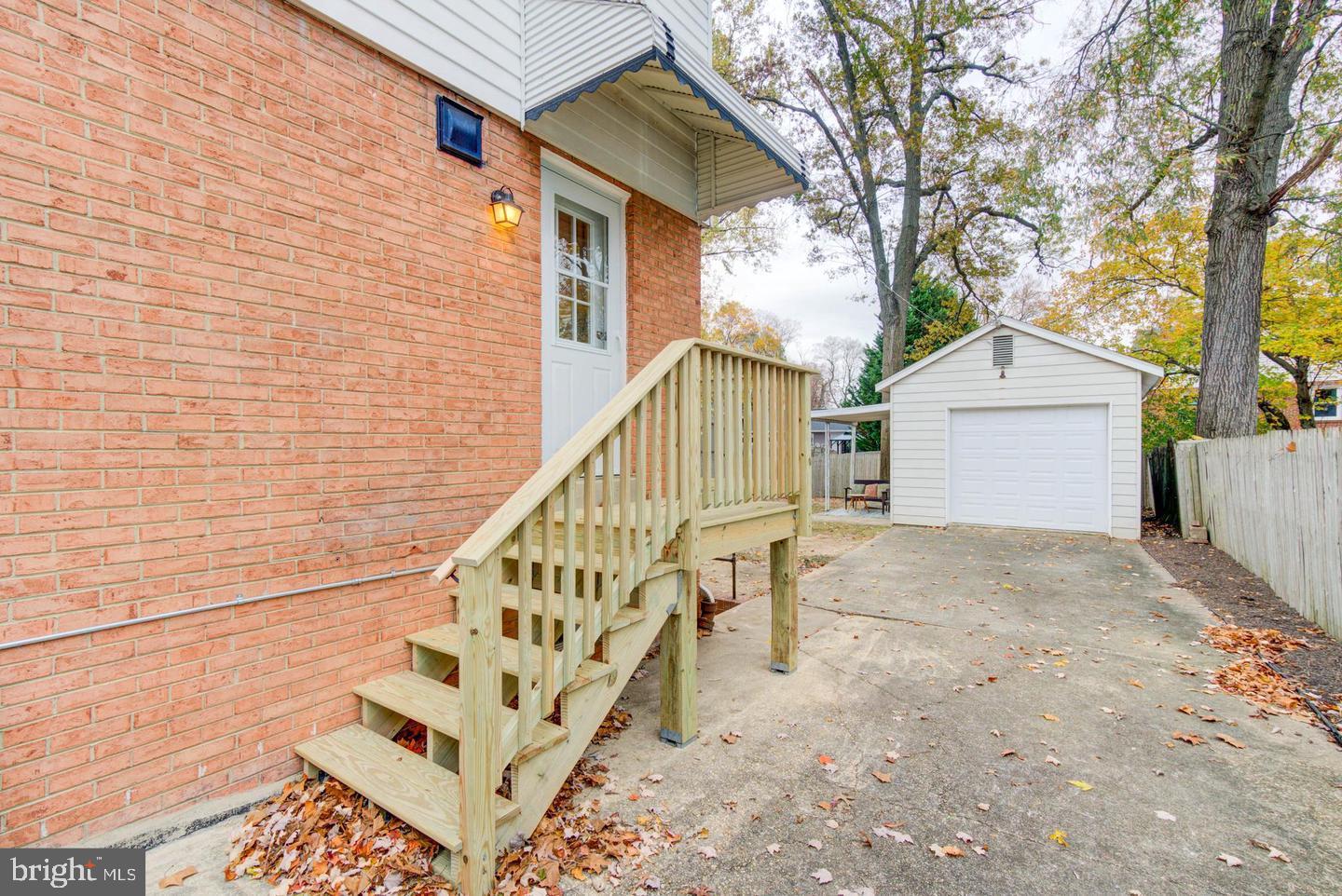 11207 Emack Road Beltsville, MD 20705 - Photo 38 of 43 Charming entryway with serene surroundings.