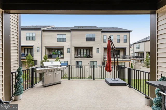 a living room with a flat screen tv and a fireplace