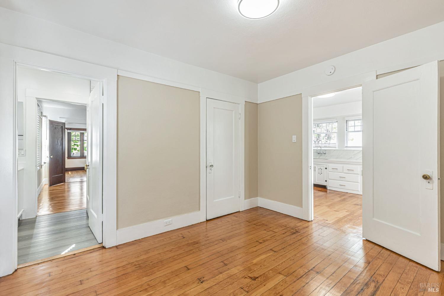 1528 Sutter Street Vallejo, CA 94590 - Photo 19 of 33 a view of empty room with wooden floor