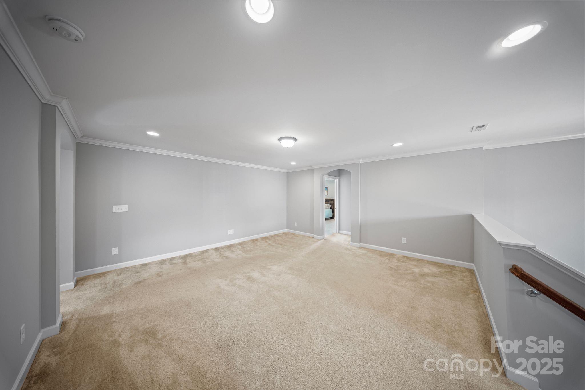 1433 Cilantro Court Tega Cay, SC 29708 - Photo 20 of 42 a view of an empty room