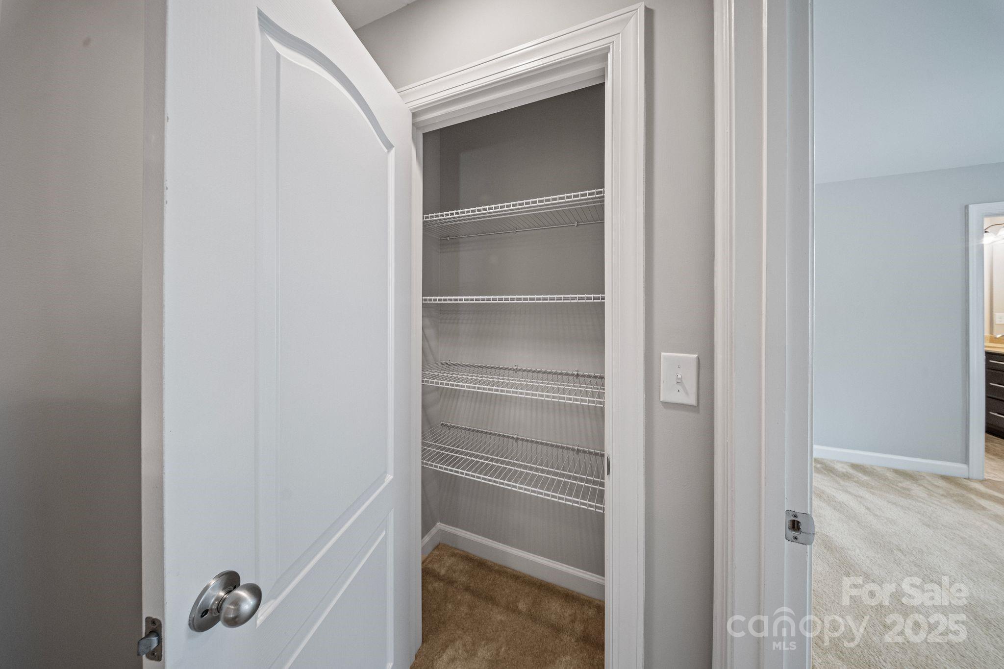 1433 Cilantro Court Tega Cay, SC 29708 - Photo 27 of 42 a walk in closet with closet