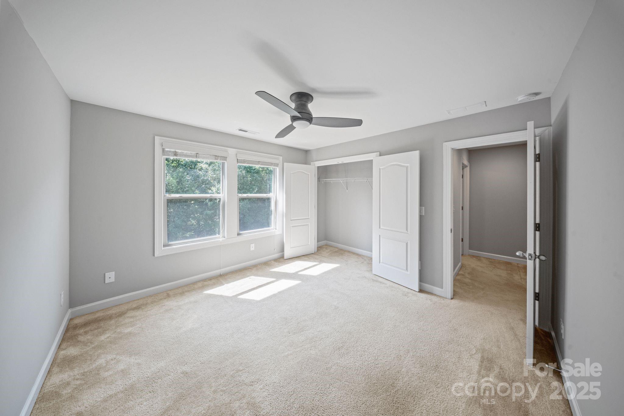 1433 Cilantro Court Tega Cay, SC 29708 - Photo 30 of 42 a view of an empty room with a window