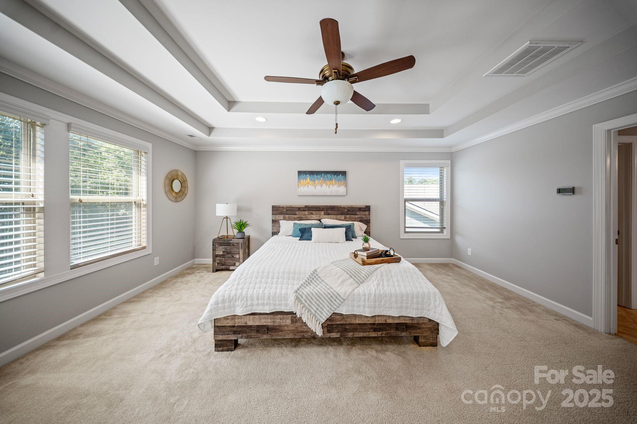1433 Cilantro Court Tega Cay, SC 29708 - Photo 33 of 42 a bedroom with a bed and window